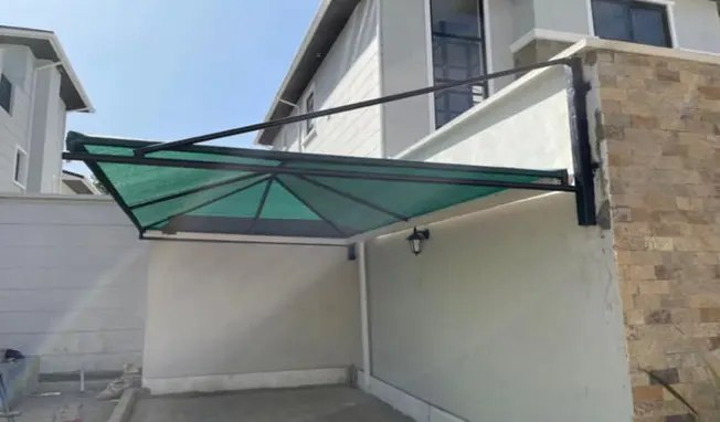 Wall-mounted car parking shade in Nairobi.